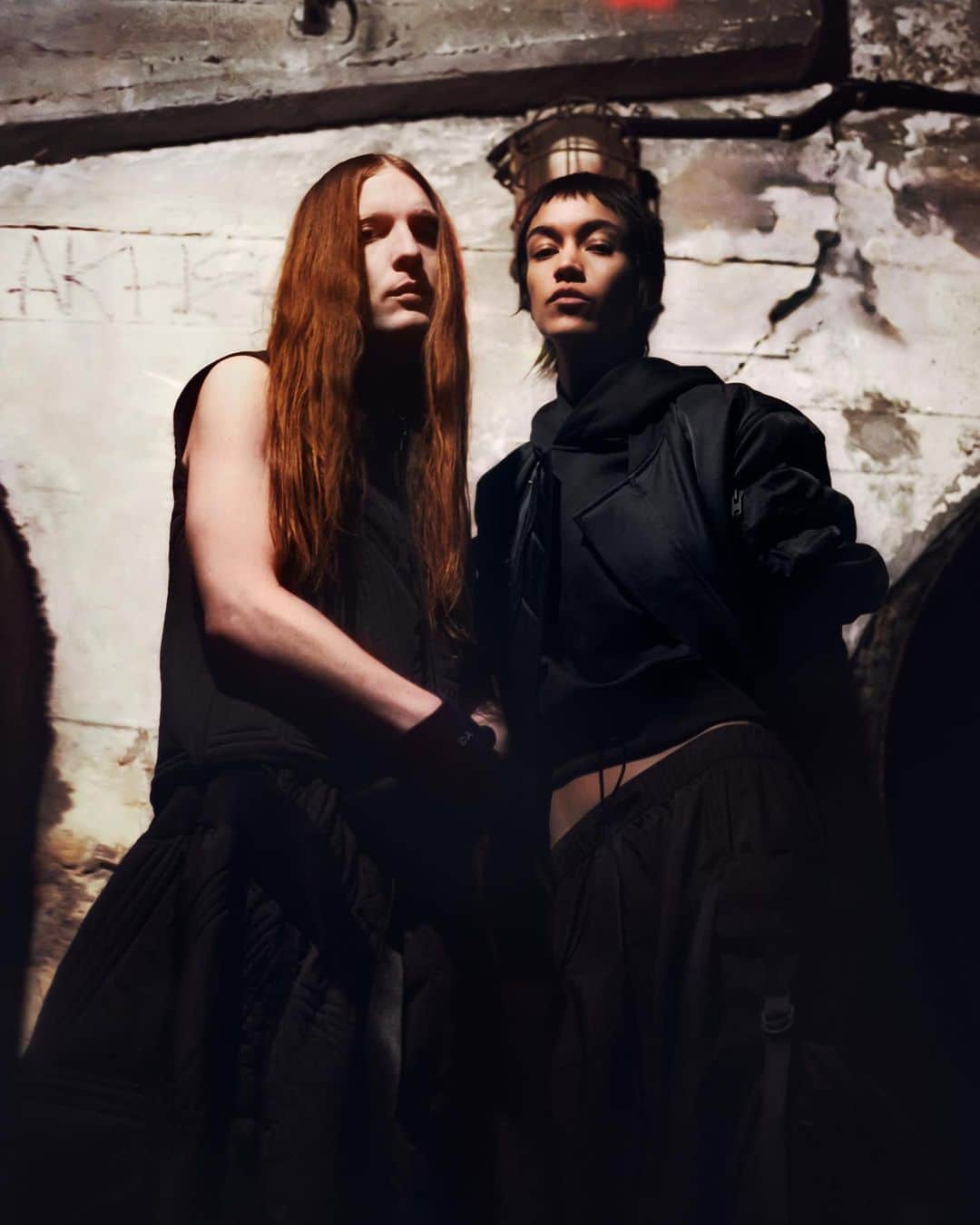 ワイスリーのインスタグラム：「@ozmadmitra & @soraya_co1​  Lensed by @1engua and @thyagosainte, Mitte, Berlin, 2023​.  Dmitra and Soraya are both DJs and co-founders of​ Kontinuum Productions, a music event and platform​ series based in Berlin. Together they create music​ and live sets with bass-heavy club tracks contrasted ​with soothing melodies.​  Chapter 3, FW23​  #adidas #Y3 #YohjiYamamoto」