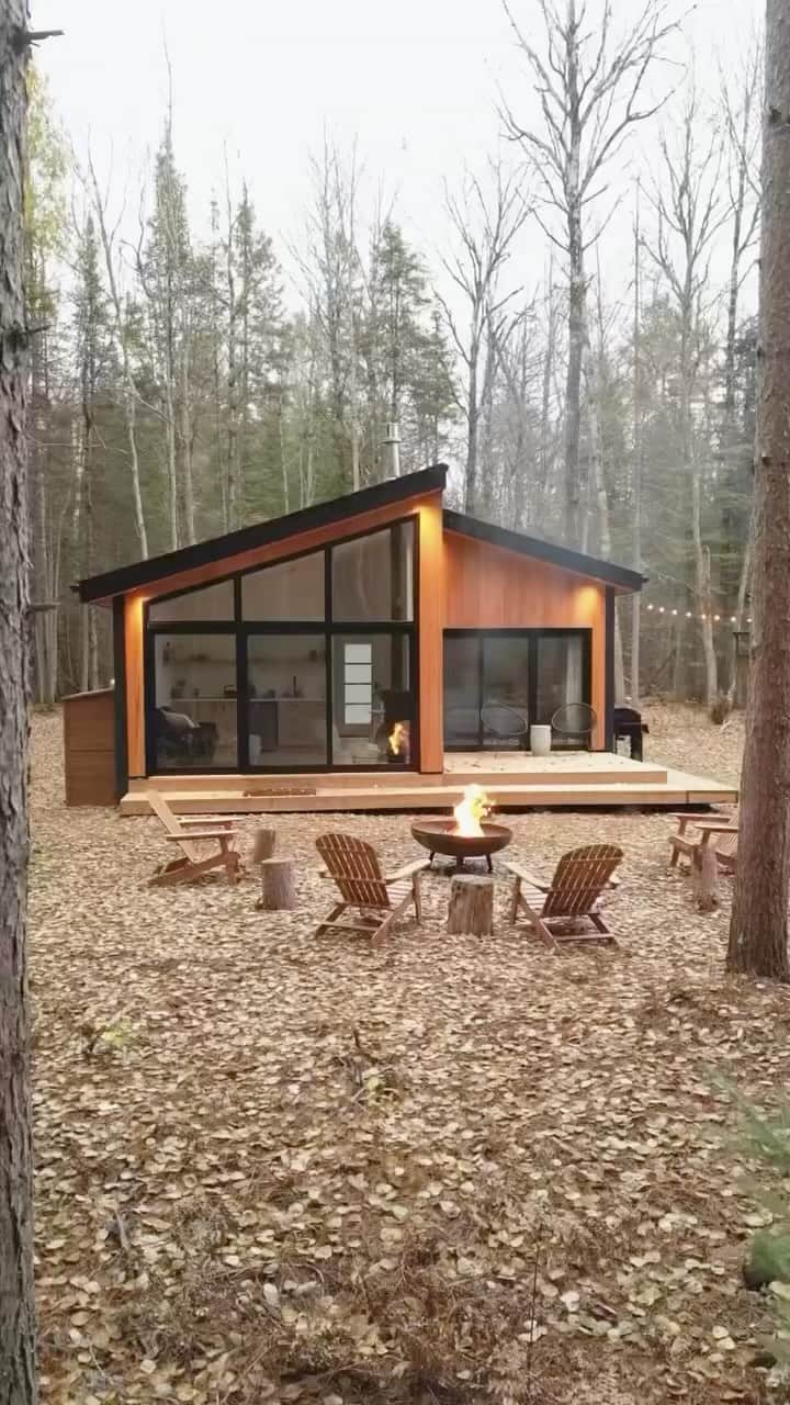 Airbnbのインスタグラム：「Nestled on 2 acres of land, this modern cabin may be small, but packs a mighty punch.」