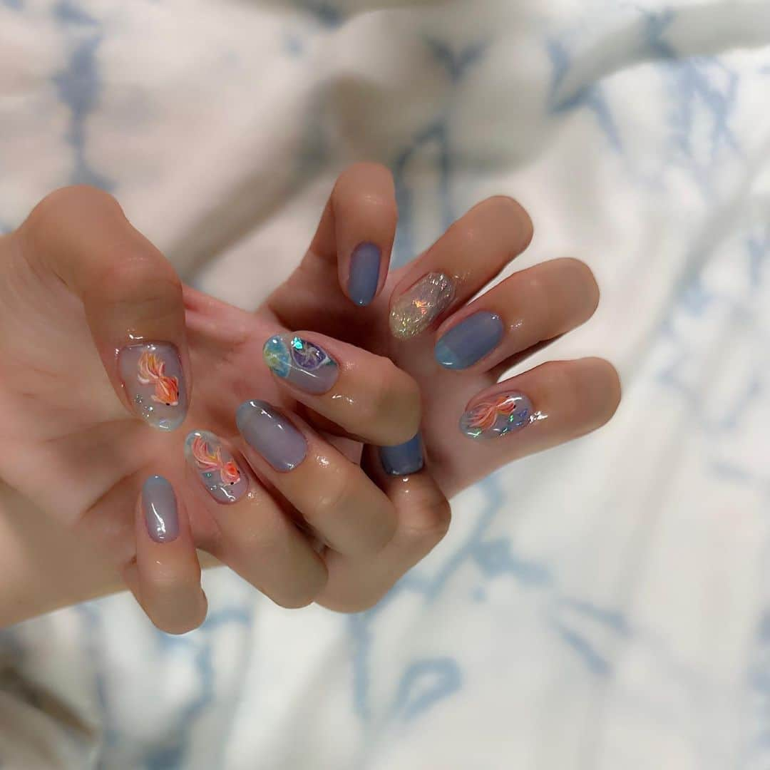 三浦優奈のインスタグラム：「🔻金魚ネイル🔻 セルフネイルでやってます💅  #三浦優奈nails ↑作品まとめてあります！  #ネイル #ネイルデザイン #ジェルネイル #せるふねいる #セルフジェルネイル #セルフジェルネイル初心者 #セルフジェル #nail #nails #nailart #naildesign #naildesigns #夏ネイル #summernails #2023 #2023nails #2023summer #お祭りネイル #祭ネイル #金魚 #金魚ネイル #goldfish #goldfishnails #ブルーネイル #bluenails #blue #青ネイル #朝顔 #あさがお」