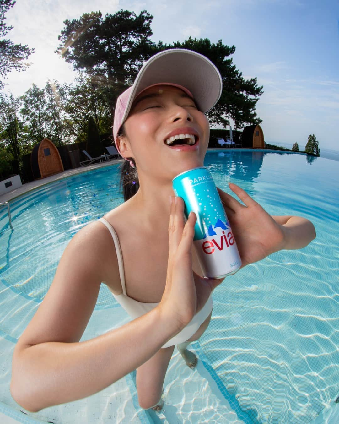 evianのインスタグラム：「Beat the summer heat 🕶​​  Remember the best way to stay cool in this heat is by staying hydrated with evian mineral water💧 ​  #evian #pool #swimming #LiveYoung」