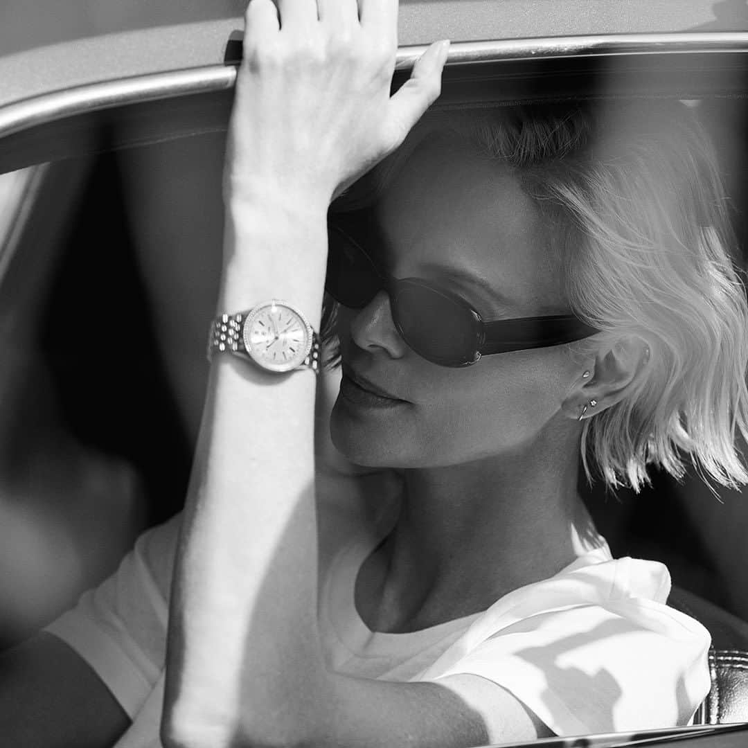 ブライトリングのインスタグラム：「Charlize Theron’s Navitimer of choice is a mint green 36 mm dial combined with our stainless steel seven-row bracelet. And yours?    #breitling  #forthejourney #navitimer  #luxury #swissmade #watches #womenswatch #charlizetheron」