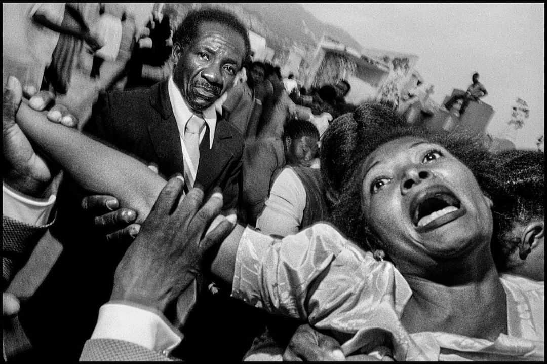 Magnum Photosのインスタグラム：「Instagram LIVE with Bruce Gilden tomorrow, September 6, at 11 AM EDT / 4 PM BST 📣⁠ ⁠ @bruce_gilden will be taking over the @magnumphotos account with a LIVE, walking us through the detailed process and story behind two of his photobooks, Haiti and The Circuit, followed by a Q&A with the audience.⁠ ⁠ Originally published in 1996, Haiti has been brought to new life this year with an expanded volume co-published by @atelier_exb and @gost_books. The series of dramatic, confrontational images saw Gilden travel to the country over 20 times, striving to capture its unique energy and rich visual diversity.⁠ ⁠ The Circuit, released in 2022, features an eponymous community of biker groups in New York City. Gilden will be discussing how he came to befriend the Circuit and explaining his approach to photography and sequencing for the project. ⁠ ⁠ "My projects are always visual. I find beauty in things that generally people wouldn’t find beautiful. So, to me, that’s the trigger.” 📸⁠ ⁠ Subscribe to the reminder on this post to ensure you don’t miss the event.⁠ ⁠ PHOTOS: Port-au-Prince, Haiti. 1984-1994.⁠ ⁠ © @bruce_gilden / Magnum Photos」