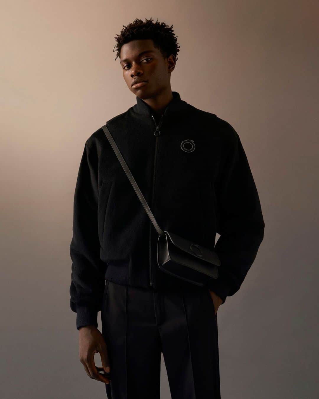 トラサルディのインスタグラム：「In the #TrussardiFW23 collection, traditionally preppy looks are interrupted with modern details and silhouettes, creating a wardrobe that is both classically elegant and contemporary. Available soon in stores and online.」