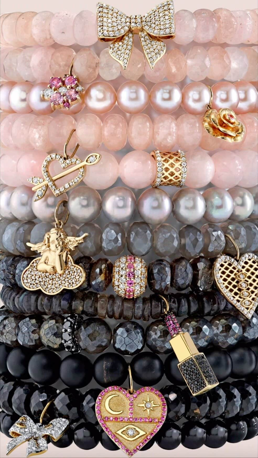のインスタグラム：「Meet the Feminine Fatale Stack 💗🖤 This stack captures the duality of feminine fatale, transitioning seamlessly from soft pink morganite stones, to sophisticated grey pearl, and ultimately to captivating black onyx.   Which bracelet is your favorite?  #SydneyEvan」