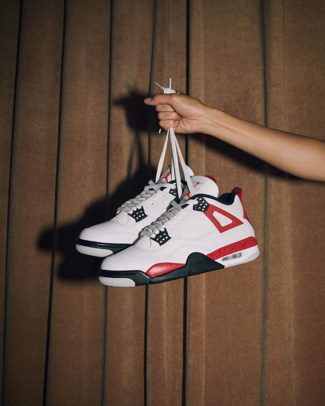 Jordanのインスタグラム：「Feel as good as you look with the new AJ4 'Red Cement,' featuring Brooklyn's It Girl @kittycash.  Click the link in bio to get notified.」