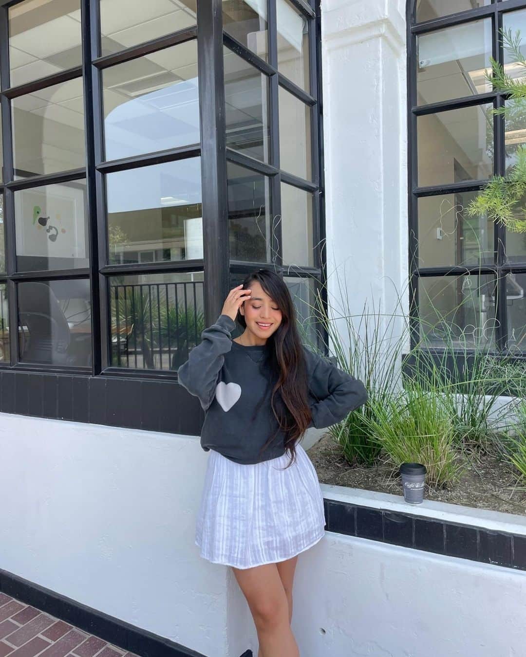 のインスタグラム：「FALL STARTER PACK: Our Blurred Heart Cody Sweater a must-have fall transition piece - pairs it perfectly with a skirt for those warmer fall days!⁠ ⁠ @dixie_3 #wildfoxcouture ⁠ ⁠」