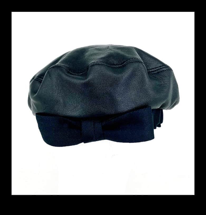 バーンストックスピアーズのインスタグラム：「A gorgeous beret in soft black leather with a Webbing bow.  Hand made in our East London studio.」