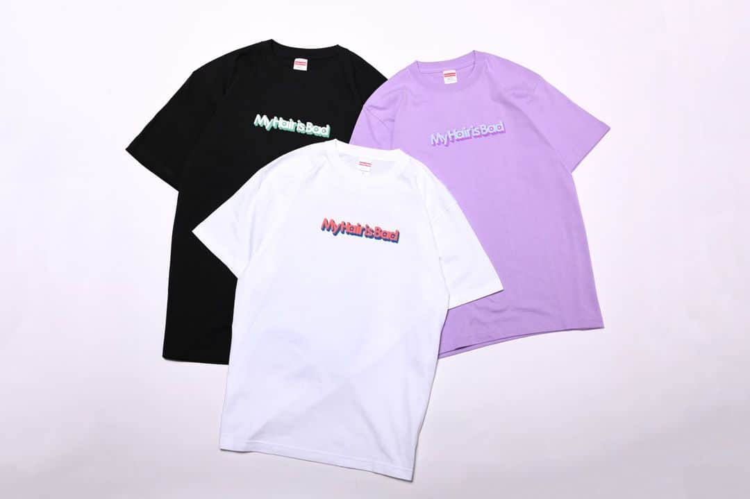 のインスタグラム：「9.9(土)ベリテンライブ2023から販売開始！  【三次元ロゴTシャツ】  カラー：ホワイト / ブラック / パープル サイズ：M / L / XL 価格：3,300円  ★立体感のある発泡プリント！ バックにも反転ロゴプリントあり  #マイヘアのホームランツアーじゃないけど新グッズ」