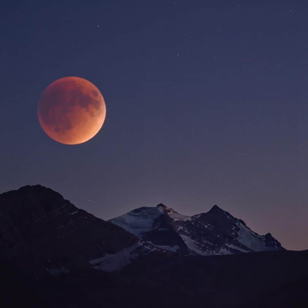 Keith Ladzinskiのインスタグラム：「Lunar eclipse, doubled exposed over glacier national park. For @natgeo 9/2016 - - - #lunarEclipse #bloodMoon #glaciernationalpark」