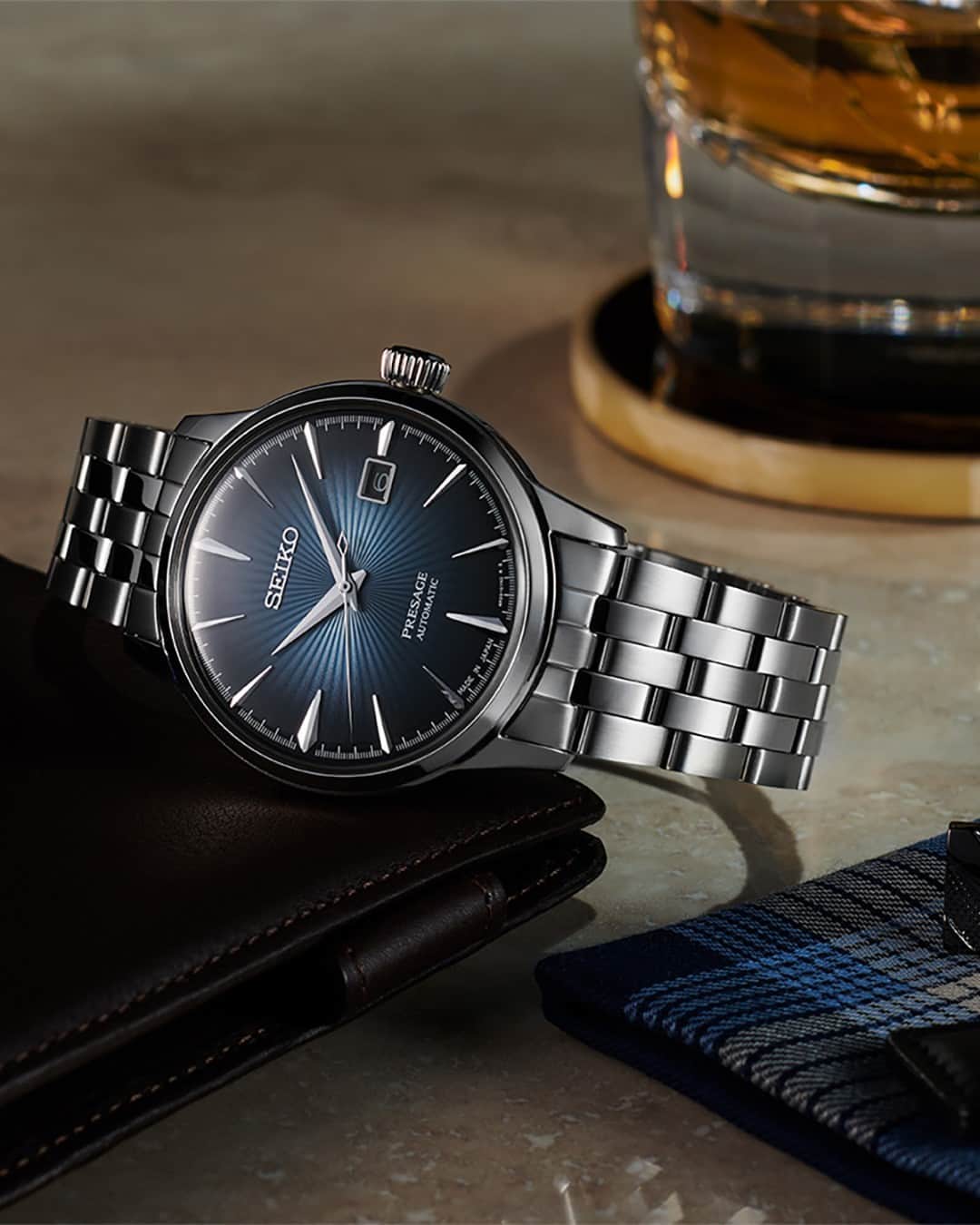 Seiko Watchesのインスタグラム：「Winding Down In Your Favorite Timepiece ⌚ - Stay precise in Presage with this stunning blue dial with pressed pattern and gloss finish, paired with a contemporary stainless steel case and bracelet to really make your ensemble shine.  #SRPB41 #Seiko #Presage」