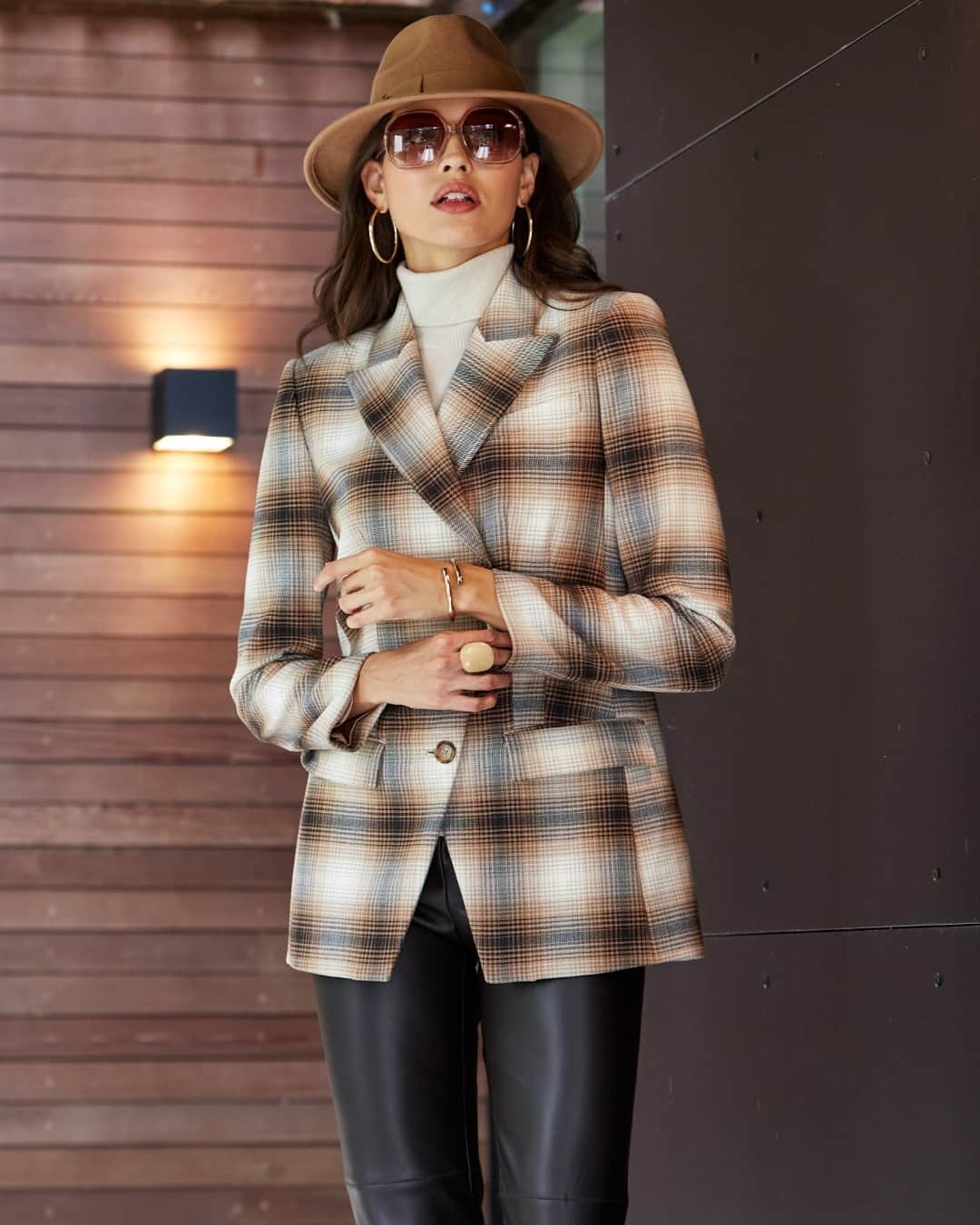 エリータハリのインスタグラム：「Borrowed from the boys, redefined by you. Elevate your autumn look with the blazer that bridges the gap between classic and contemporary.   Shop our new Double Breasted Ombre Plaid Blazer exclusively available to shop at elietahari.com & Elie Tahari Collection Stores. 🍁🕶️」