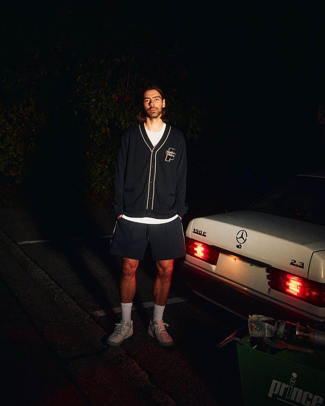 のインスタグラム：「Prince vs Reigning Champ: Collection Two is now available in-store, online & through select global stockists.  From public court cages to grand slam stadiums, Prince vs Reigning Champ channels the golden era of tennis throughout the mid-80s and 90s. For our second collaboration, we mine the rich history of the collegiate game, referencing classic team colours and storied varsity traditions.  Featuring co-branded graphics and a palette of navy & creme, the 8-piece capsule comprises a roster of apparel and accessories manufactured by Reigning Champ, with a limited-edition Original Graphite 107 Racquet & Case, once again developed by Prince. All styles are unisex, and universal on and off court.  #princevsreigningchamp」