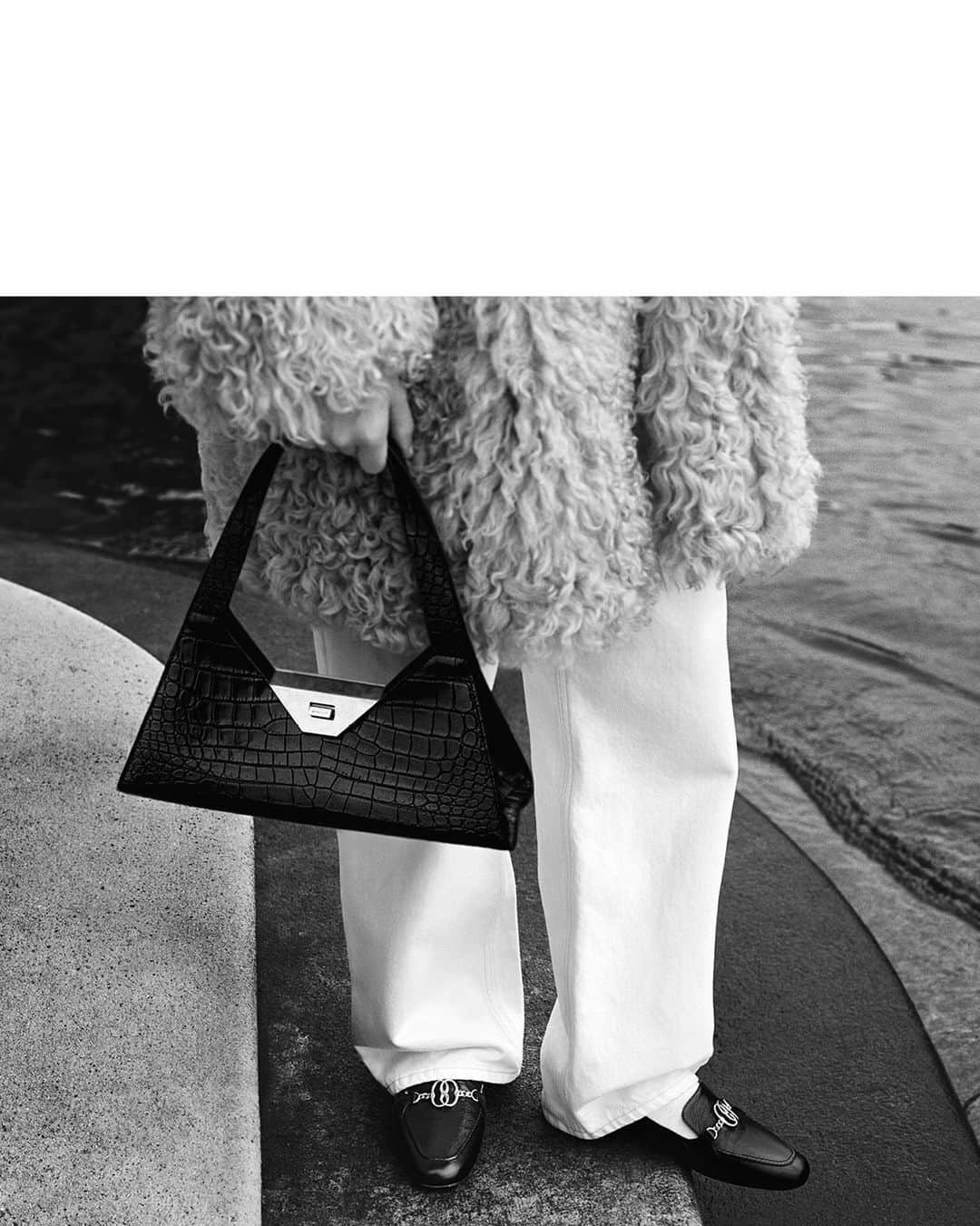バリーのインスタグラム：「THE FALL/WINTER 2023 CAMPAIGN Lugano, Switzerland.  Design Director: Simone Bellotti Art Director: Christopher Simmonds Photographer: Alasdair McLellan  Stylist: Charlotte Collet  Casting Director: Ben Grimes  Hair: Anthony Turner  Make-up: Lucia Pica   @alasdairmclellan, @charlottecolletcollet, @ben_grimes_casting, @anthonyturnerhair, @luciapicaofficial   #Bally #BallyFW23」