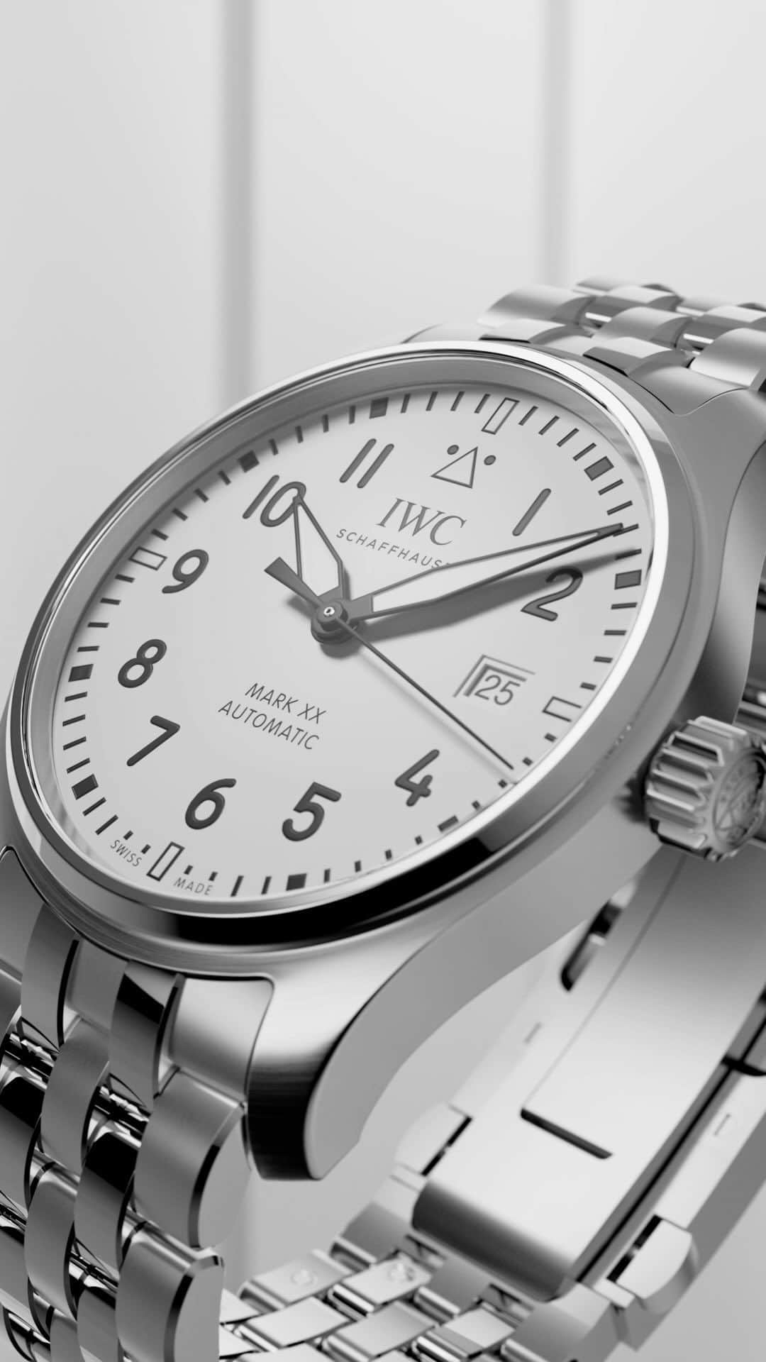 IWCのインスタグラム：「Pure essence.  The Mark XX reduces the design and technical functionality of a pilot’s watch to its pure essence. The Pilot’s Watch Mark XX is water-resistant to 10 bar and is fitted on a 5-link stainless steel bracelet. Thanks to the integrated EasX-CHANGE® system, the bracelet can be easily exchanged.  #IWCpilot | #IWCwatches  🔗Link in Bio  ℹ Gris argent dial Stainless steel case 40mm IWC-manufactured 32111 Calibre Ref. IW328208」