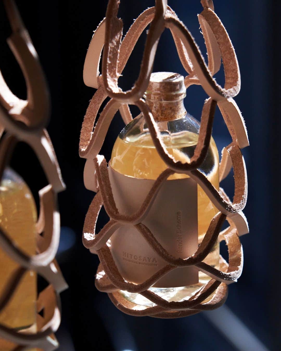 エンダースキーマのインスタグラム：「'DEAR DEER' by mitosaya @3tosaya and Hender Scheme. The spirits distilled from deerskin with a hint of Japanese peppers, matured in oak barrels. Comes with a leather bottle label and a leather holder in vegetable tanned leather by Hender Scheme.  DEAR DEER PLACE: スキマ 恵比寿／合羽橋／宮下公園、大阪、mitosayaオンラインショップ  #mitosaya #henderscheme #DEARDEER」