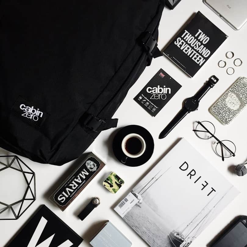 CABINZEROのインスタグラム：「You can't miss our #ABSOLUTEBLACK shade 💥  🛍� Link in bio  Features:  Side compression straps Shoulder straps and airflow system Top handle Side handle Lockable sliders on the main compartment Tracking tag Laptop sleeve Spacious inner zip pocket Spacious inner zip mesh pocket Quick access zip pocket on front panel Photo by WALIDS  #CabinZero #Travel #backpack #packing #Zerohassletravel」