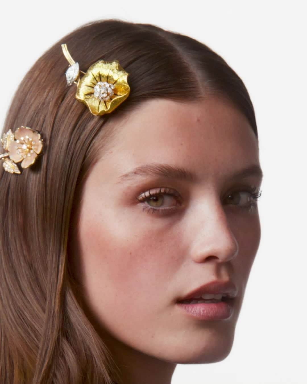 ブシュロンのインスタグラム：「STYLISH ARCHIVES⁣ ⁣ 1955 – Eglantine clip – gold, diamonds, and pink enamel⁣ 1959 – Capucine clip – gold and diamonds on platinum⁣ Circa 1890/1900 – Bind beetle brooch – Ruby and diamonds on gold ⁣ ⁣ Come take a closer look as we open our archives and unveil a selection of pieces dating back to the end of the 19th Century. No, you're not dreaming... these are designs from the past. Living proof that innovation and style have always guided the Maison's creativity.」