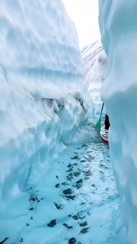 Padgramのインスタグラム：「This is what dreams are made of.  We were dropped off by a helicopter on the middle of a 25 mile long glacier in remote Alaska. The melt pools glowing turquoise all around us. As fast as we could fill up our SUPs, @murphyphoto @skye_dive_  @tyler_trant @wilbo_shay and I were paddling through glacier canyons.  Ice walls towered above us as the blue glacier water flowed below.  Its hard to fathom that this is real life sometimes!  Credit by 🎥@roamwild_   #pgdaily #pgstar#pgcounty #ice #planetgo#planet #planetearth #amazing #awesome #nature #iceworld #alaska #alaskausa」