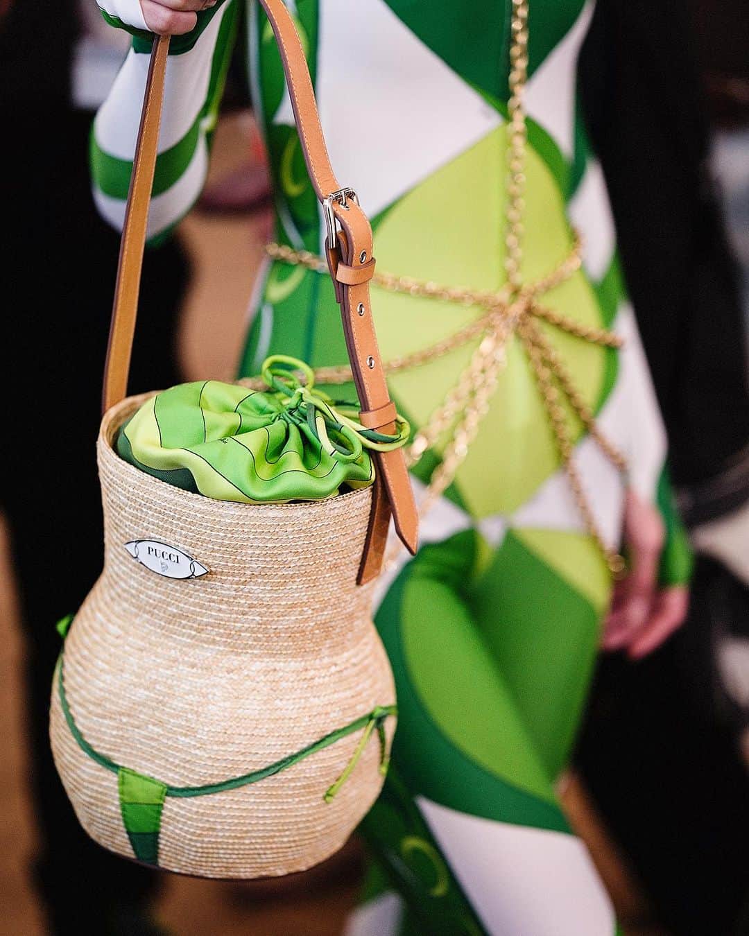 エミリオプッチのインスタグラム：「Turn heads with your Puccinella, a bag dressed for the summer heat.   Shot by @edouardcaupeil   #Pucci #InitialsEP」