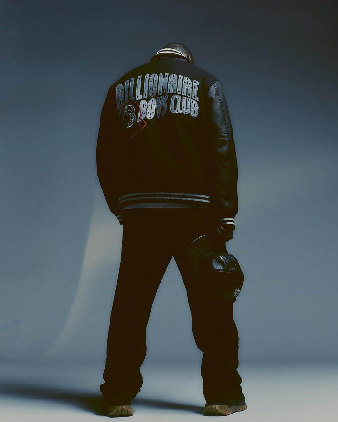 モンクレールのインスタグラム：「Clipse’s No Malice embodies the Billionaire Boys Club creative community in a standout varsity jacket with custom combined logos from the new capsule collaboration.   Explore Moncler x Billionaire Boys Club now on moncler.com.   @bbcicecream @nomalice757   #MonclerBillionaireBoysClub」