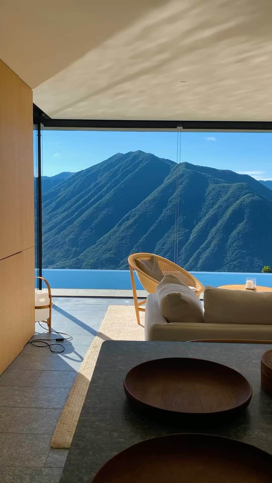 BEAUTIFUL HOTELSのインスタグラム：「@enrico_costantini transports us to Villa Peduzzi in Lake Como. ⛰️ With azure skies, mountain vistas and chic accommodation options, it’s not hard to see why it’s such a popular destination. 😍 Nestled in the foothills of the Alps, whether you seek adventure or relaxation, this captivating Italian haven offers peaks, shores, quaint villages and lush valleys. 🇮🇹  If you’ve been, what’s your favorite memory from Lake Como? 💭  📽 @enrico_costantini  📍 @villapeduzzi, Lake Como, Italy 🎶 Henry Mancini - Lujon」
