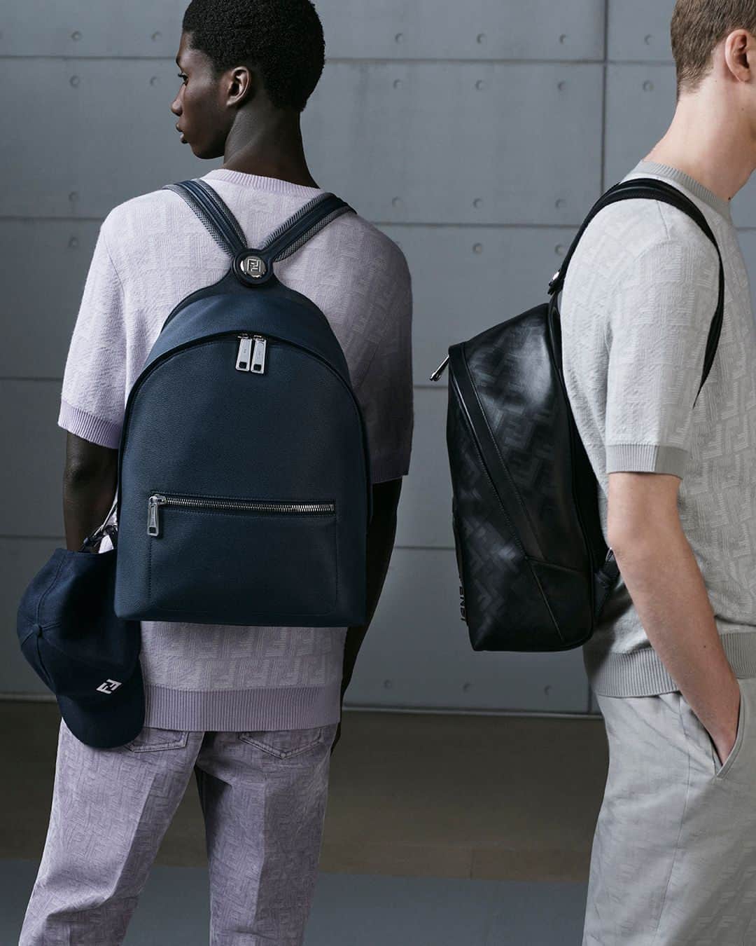 Fendiのインスタグラム：「Subtle nods to signature motifs and an innovative strap hinge make the Fendi Chiodo backpack an essential for the season ahead.⁣ ⁣ Shop #FendiFW23 in boutiques and at Fendi.com.⁣ ⁣ Artistic Director of Accessories and Menswear: @silviaventurinifendi ​⁣ Artistic Director of Jewellery: @delfinadelettrez​⁣ ⁣ Photography: @brunostaub ⁣ ⁣ Styling: @ganio⁣ Makeup: @samiamohsein⁣ Hair: @ramoneyluv⁣ ⁣ Casting: @piergiorgio⁣ ⁣ Models: Vasko Luyckx, Douta Sidibe」