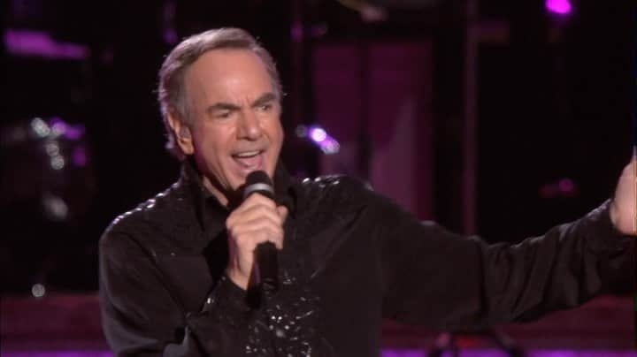 ニール・ダイアモンドのインスタグラム：「Feel the fire of “Cracklin' Rosie” all over again as Neil Diamond ignites the stage at Madison Square Garden in 2008. Check out the three new live performance videos from this Hot August Night over on YouTube! ~Team Neil #NeilDiamond #HotAugustNight #CracklinRosie」