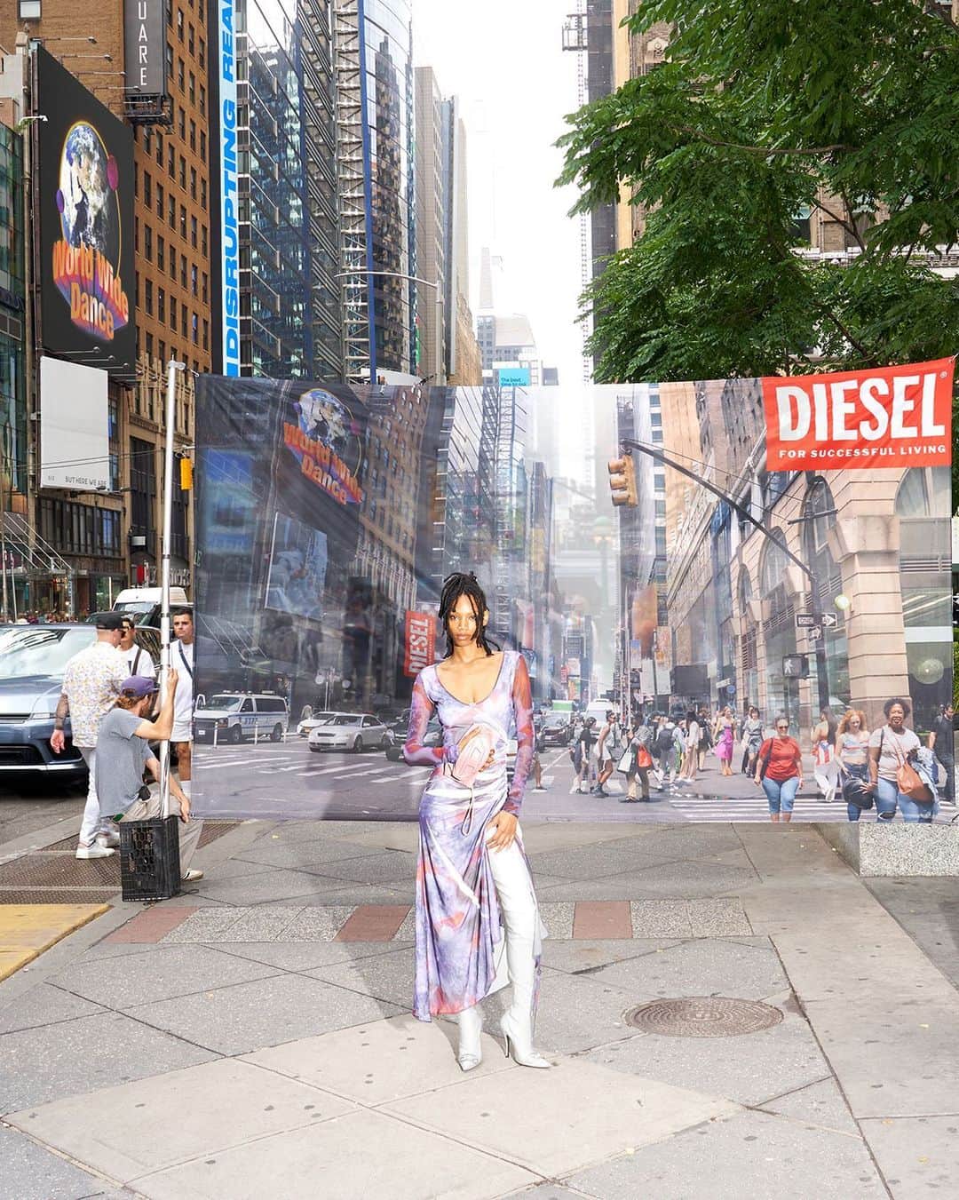 ディーゼルのインスタグラム：「Set it in motion.  The abstract print and soft drape of the D-Arien dress give it range to be adopted to any occasion, any mood, any location. Shot in the street of New York City. Ready to go wherever you are.  Tap to shop and discover dresses at the link in bio.  #ForSuccessfulLiving #DieselFW23」