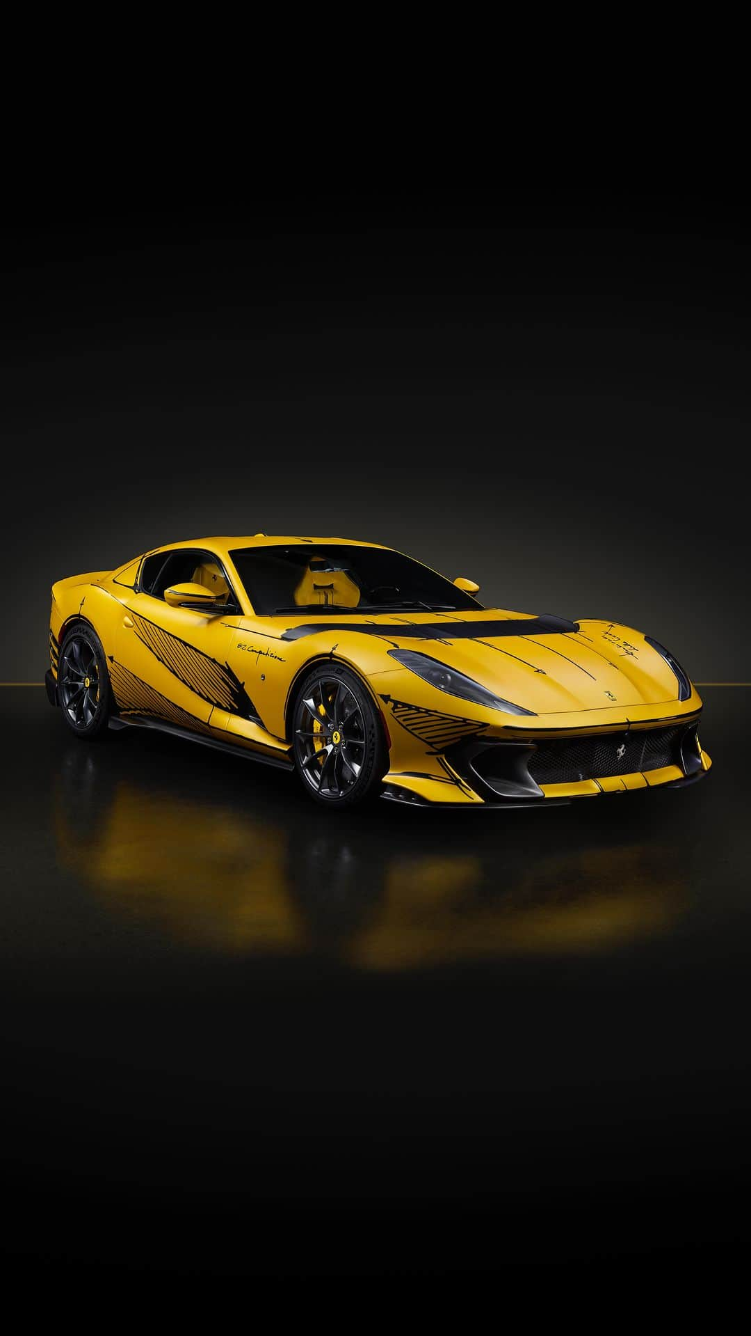 フェラーリのインスタグラム：「Introducing the one-of-a-kind #Ferrari812Competizione. This Tailor Made Ferrari was inspired by the concept of a “blank sheet,” which is how the Ferrari Styling Centre begins its research for every new model — ideas, insights, and notes sketched on yellow cardboard, now brought to life. ⁣ ⁣ Atop the matte Giallo Tristrato exterior are lines composed by @flaviomanzoni, the chief designer who imagined the elegant and sporty forms of the 812 Competizione, with his most iconic details traced in matte Nero DS Sketch. ⁣ ⁣ A work of art, and unlike any spec ever created, this Tailor Made Ferrari 812 Competizione will be auctioned for charity at the Ferrari Gala in New York City this fall. ⁣ ⁣ #Ferrari #FerrariTailorMade」