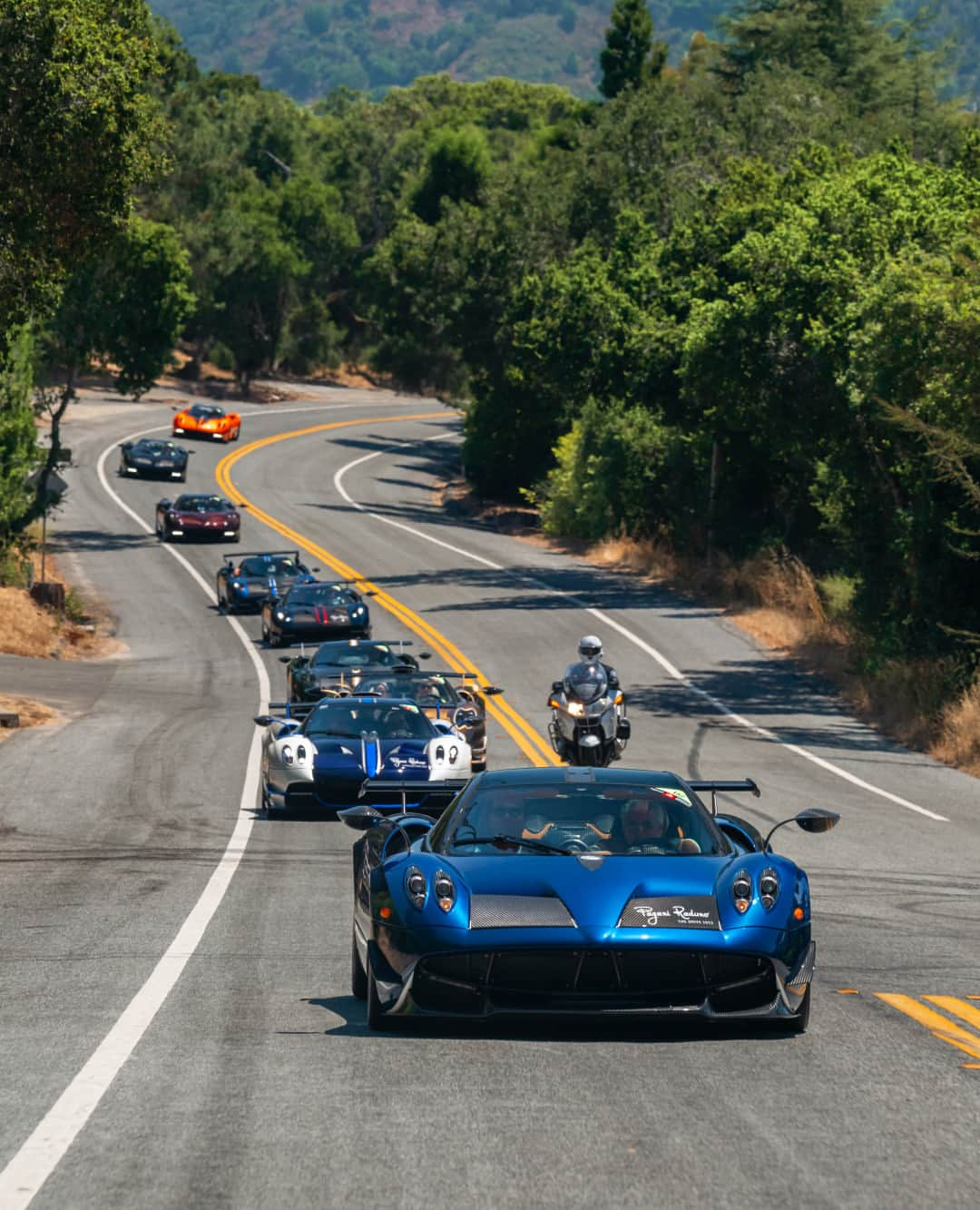 パガーニ・アウトモビリのインスタグラム：「Crossing the hills of Monterey to Seaside.  The parade that brought us to @exoticsonbroadway was a unique occasion to share the beauty of our Hypercars with so many enthusiasts!  #Pagani #MontereyCarWeek #Huayra #Zonda #Utopia」