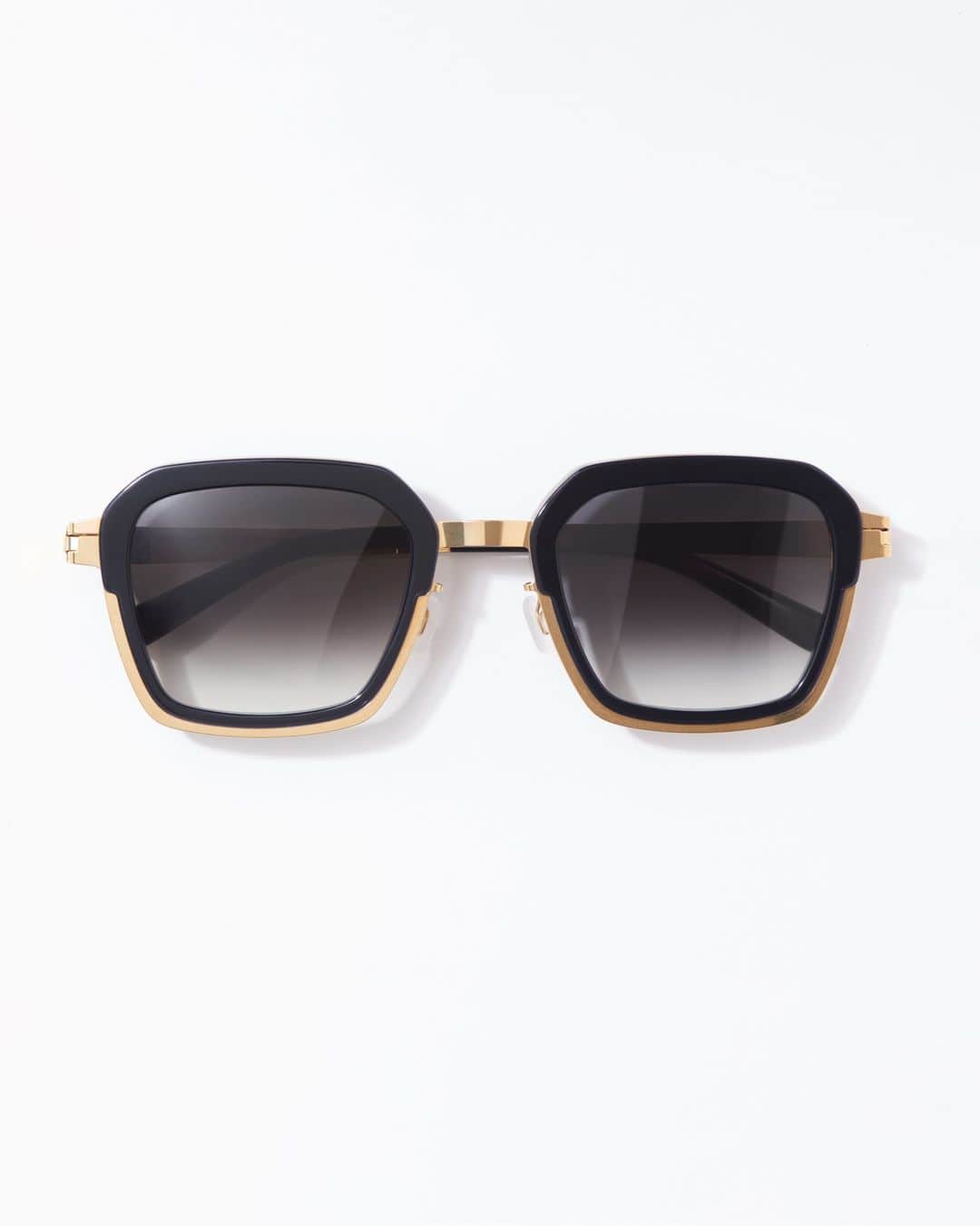 MYKITAのインスタグラム：「Meet MISTY – our latest pair of statement shades, capable of elevating the simplest ensemble into an expression of cosmopolitan chic  MISTY in Glossy Gold/Milky Indigo with Raw Black Gradient lenses.  Available now on mykita.com – discover more colourways」