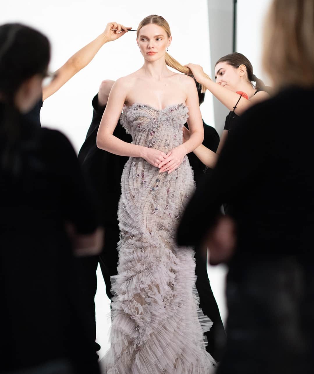 Marchesaのインスタグラム：「Crafting Elegance: The team meticulously perfecting every detail on set at the Pre-Fall 2023 Marchesa shoot. Now available @neimanmarcus - link in bio.   #PF23Marchesa #Marchesa」