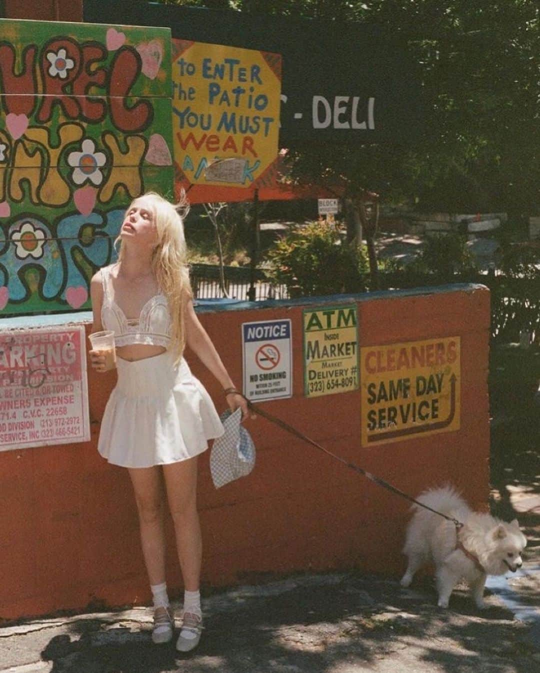 ペティート・メラーのインスタグラム：「Sur-Real, above Reality. #Film photographed by my Fav guy @andreytarasovs in my fav place on #LoveStreet where you can find The best potato salade 👅 Top @curios_Tokyo shoes @carelparis #LosAngeles #LoveCafe #Laurel」