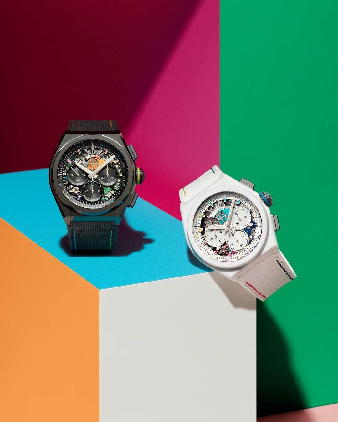 ゼニスのインスタグラム：「#Defy21Chroma: ZENITH's uniquely chromatic expression of high-frequency precision returns in the DEFY 21 Chroma II, two limited editions in white and black ceramic loaded with vibrant colours on the open dial, movement and even the strap.  The DEFY Chroma II in black ceramic is limited to 500 pieces and available at ZENITH boutiques and authorized retailers around the world, while the white ceramic edition of 500 pieces is exclusively available at ZENITH physical and online boutiques.」