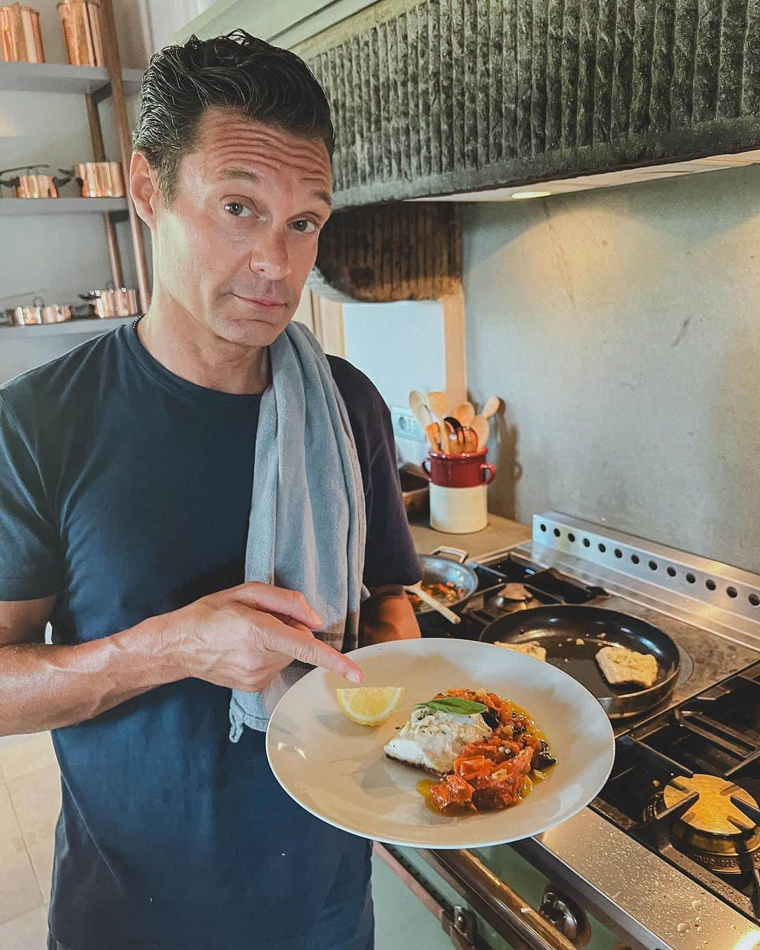 ライアン・シークレストさんのインスタグラム写真 - (ライアン・シークレストInstagram)「I love sea bass in the summer. It’s simple and a great opportunity to use quality extra virgin olive oil 🫒  Step 1 Put a little olive oil, salt, pepper, and herbs on the raw fish  Step 2 Separately cook some summer tomatoes with sage, basil, garlic, and olive oil in a pan  Step 3 Heat the pan. I use grapeseed oil when pan frying due to its high smoke point and its clean taste. Cook the fish skin side down until it’s cooked through (I like the skin golden brown and crispy) and add minced garlic.  Step 4 Add some lemon and fresh EVOO on top and enjoy!」8月23日 3時01分 - ryanseacrest