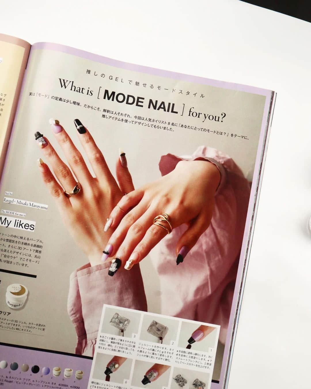 丸山美咲のインスタグラム：「・  ・  @nailvenus_magazine  @raygel.nail_official   新刊のnailvenus raygelを使用したアートlesson✏︎  テーマが"MODE(モード)" ということで、いつもの私とちょっと違う、 でも私っぽい仕上がりになってるかなと思います☺️  使用しているrayの♯68のすみれピンクが かわいいんです♡♡ 使用カラー3枚目📷👉 ・  ・  ・  ・  ⸝⸝⸝⸝⸝⸝⸝⸝⸝⸝⸝⸝⸝⸝⸝⸝⸝⸝⸝⸝⸝⸝⸝⸝⸝⸝⸝⸝⸝⸝⸝⸝⸝⸝⸝⸝⸝⸝⸝⸝⸝⸝⸝⸝⸝⸝⸝⸝⸝⸝⸝⸝⸝⸝⸝⸝⸝⸝⸝⸝⸝⸝⸝⸝⸝⸝⸝⸝ 𝒏𝒂𝒊𝒍 𝒔𝒂𝒍𝒐𝒏 𝒎𝒊𝒄𝒉𝒆𝒍𝒊𝒏𝒆.   𝚊𝚍𝚍：兵庫県尼崎市南武庫之荘𝟷-𝟷𝟽-𝟷 𝟷𝙵 𝚊𝚌𝚌：阪急武庫之荘駅より徒歩𝟹分 𝚖𝚊𝚒𝚕：𝚖𝚒𝚜𝚊𝚔𝚒𝚗𝚊𝚒𝚕@𝚐𝚖𝚊𝚒𝚕.𝚌𝚘𝚖 𝚘𝚙𝚎𝚗：𝟿:𝟹𝟶-  ［ご予約/お問合せ専用公式𝙻𝙸𝙽𝙴］ @𝟸𝟹𝟾𝚙𝚌𝚗𝚢𝚟  ［𝚜𝚝𝚊𝚏𝚏 𝚒𝚗𝚜𝚝𝚊𝚐𝚛𝚊𝚖］ @micheline_nail_staff   ※ご予約は𝚑𝚘𝚝 𝚙𝚎𝚙𝚙𝚎𝚛 からも受付中𓇠 ※丸山美咲は現在ご新規のお客様受付停止中となります。  ⸝⸝⸝⸝⸝⸝⸝⸝⸝⸝⸝⸝⸝⸝⸝⸝⸝⸝⸝⸝⸝⸝⸝⸝⸝⸝⸝⸝⸝⸝⸝⸝⸝⸝⸝⸝⸝⸝⸝⸝⸝⸝⸝⸝⸝⸝⸝⸝⸝⸝⸝⸝⸝⸝⸝⸝⸝⸝⸝⸝⸝⸝⸝⸝⸝⸝⸝  #ネイルヴィーナス #raygel #ネイルレッスン」