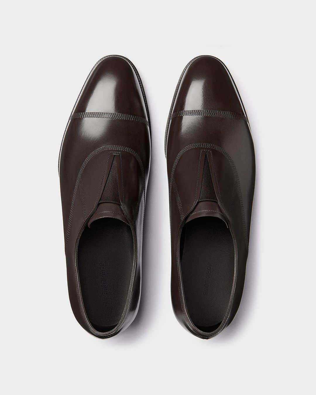ジョンロブのインスタグラム：「Introducing Mansell, minimal yet supremely elegant, this slip-on revisits a timeless silhouette with rows of  refined stitching reminiscent of tailoring details, making it the perfect pairing for elevated suiting. . #johnlobb」