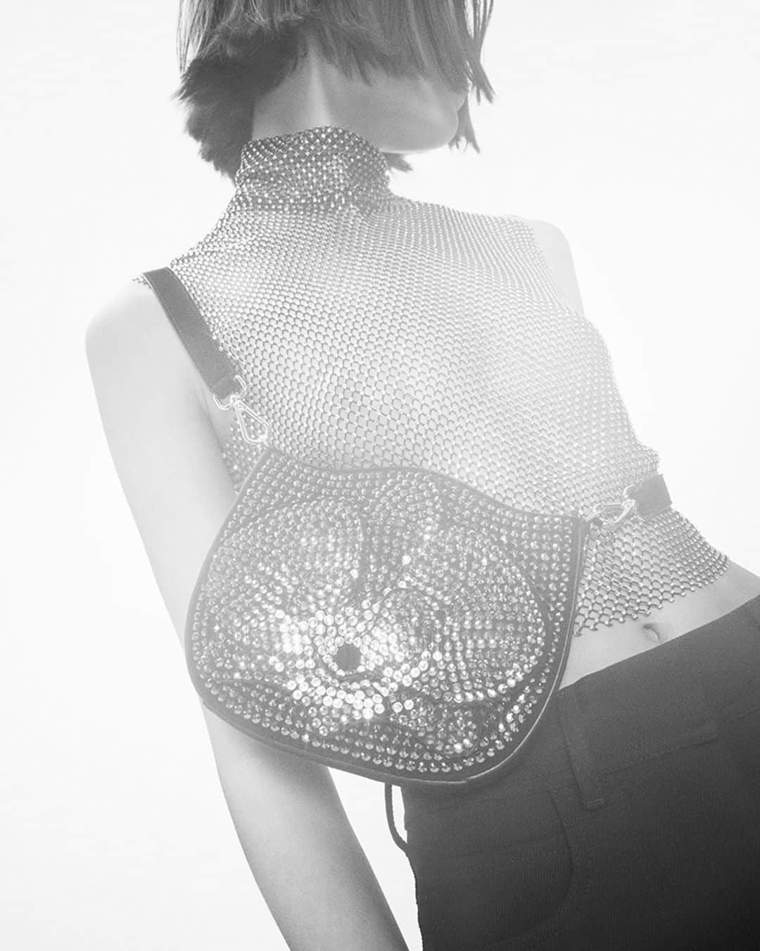 ジェニーさんのインスタグラム写真 - (ジェニーInstagram)「A triumph of brightness.  Wear the luxurious rhinestone mesh top in your very special occasions.   Discover it in boutiques and online.  #Genny  #MadeinItaly  #FW23」8月24日 16時30分 - gennyofficial