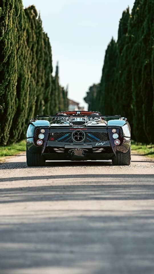 パガーニ・アウトモビリのインスタグラム：「Looking toward the future, respecting the past. #ZondaFRoadster  "We arrived at the Nürburgring Nordschleife with the customer and his car. Late afternoon when the track wasn’t busy we took it to the track and on the second lap we set the record without the roof. It was the fastest road legal Roadster ever to be driven at the Ring: 7'29", August 2008 - Horacio Pagani  #Pagani #Pagani25Anniversary #Zonda」