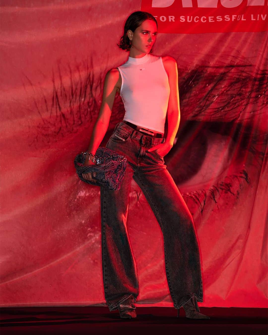 ディーゼルのインスタグラム：「Sideways glances.  Step into your mood. Find your fit. Diesel's D-Akemi jean from our DNA Washes collection of timeless denim made from low impact materials, has a 70s attitude with a flared leg and mid waist. Style it your way for a contemporary vibe.  Tap to shop and discover more at the link in bio.  #ForSuccessfulLiving #DieselFW23」