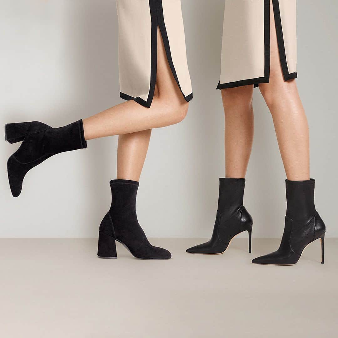 スチュアートワイツマンのインスタグラム：「Introducing the Little Black Boots Capsule: Discover all the heel heights, toe shapes and materials you could ever want — including our FLAREBLOCK 85 STRETCH BOOTIE in black stretch suede and STUART 100 BOOTIE in black stretch leather, pictured here. Crafted by SW artisans in Spain, these super-sleek sock booties deliver our signature flawless, comfortable fit. Find the perfect little black boots for any look on stuartweitzman.com.​  ​  #StuartWeitzman #FLAREBLOCK #STUART​」