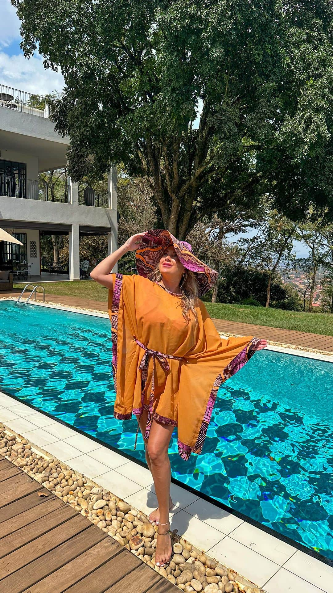 アリサ・ラモスのインスタグラム：「The most beautiful hotel I’ve stayed at in Uganda, and the most beautiful custom made kitenge fashions! 😻💃  “Kitenge” is the beautiful colorful fabric that women (and some men) wear in East, West, and Central Africa. Many women wear it as a sarong, head wrap, swaddle or sew it into outfits like these! It’s one of my favorite styles in the world!   I barely packed anything for my 3 week/6 country Africa trip because I designed what I wanted to wear and with which patterns in advance, then Yimba Uganda hand made them and tailored them to my body when I arrived!  Yimba Uganda is an amazing NGO that teaches underprivileged women several job skills and techniques, such as sewing, and then helps them profit from the clothing sales! This is my second year purchasing all of my welcome gift bags from them, my wardrobe, and my group trip gals also all bought items from them!  They were the perfect fabulous pieces to wear at Lattitude 0 hotel, which got a unanimous 😻 from our group!  We’re about to head across the country to Bwindi to do our gorilla trek, so I’ll write up a blog post for Uganda on the long drive!  Is Uganda on your bucketlist?  #uganda #kampala #kitenge #kitengefashion #lattitude0degrees #yimbauganda #yimbafashion #mylifesatravelmovie #besthotels」