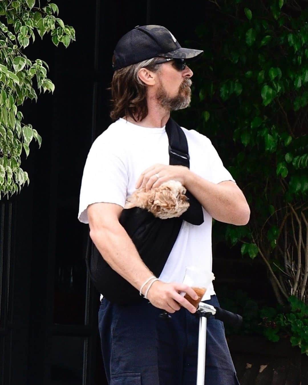 Just Jaredさんのインスタグラム写真 - (Just JaredInstagram)「Christian Bale gives his tiny puppy some pets during a scooter ride in Los Angeles #ChristianBale Photos: Backgrid」8月26日 13時15分 - justjared