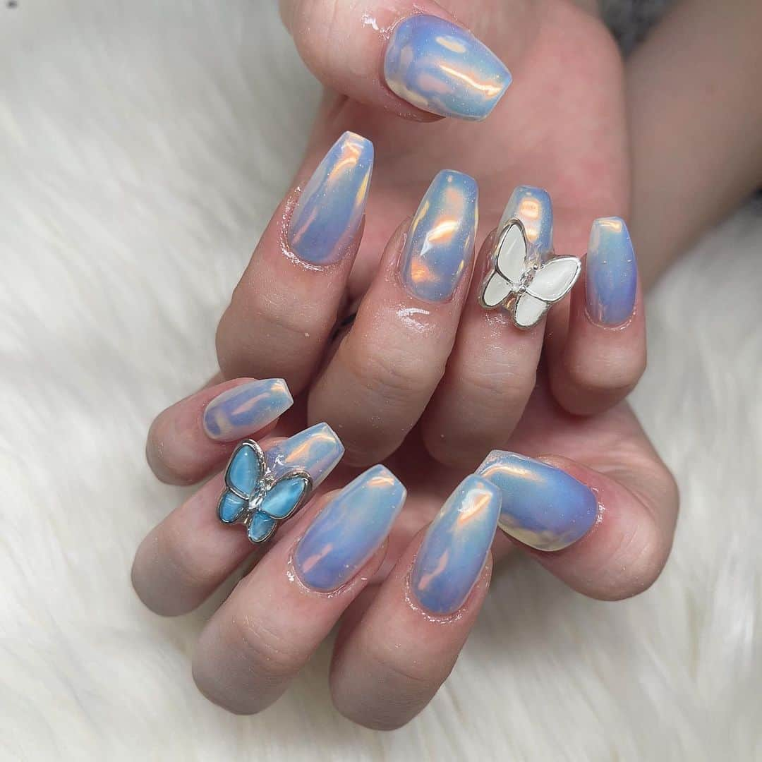 榎本セナのインスタグラム：「🦋.*˚ ⠀ ⠀  #Blue #bluenails #butterflynails  #美容 #ネイル #東京ネイルサロン #自爪ネイル #美容アカウント #美容day #オフィスネイル  ⠀  #naturalmakeup #makeup #model #モデル #いいねした人で気になった人フォロー #Japan  #撮影モデル #goodmorning  #portrait #photography #ポートレートモデル #ファインダー越しの私の世界 #hairstyle  #清楚系女子 #写真好きな人と繋がりたい  #beauty#いいね」