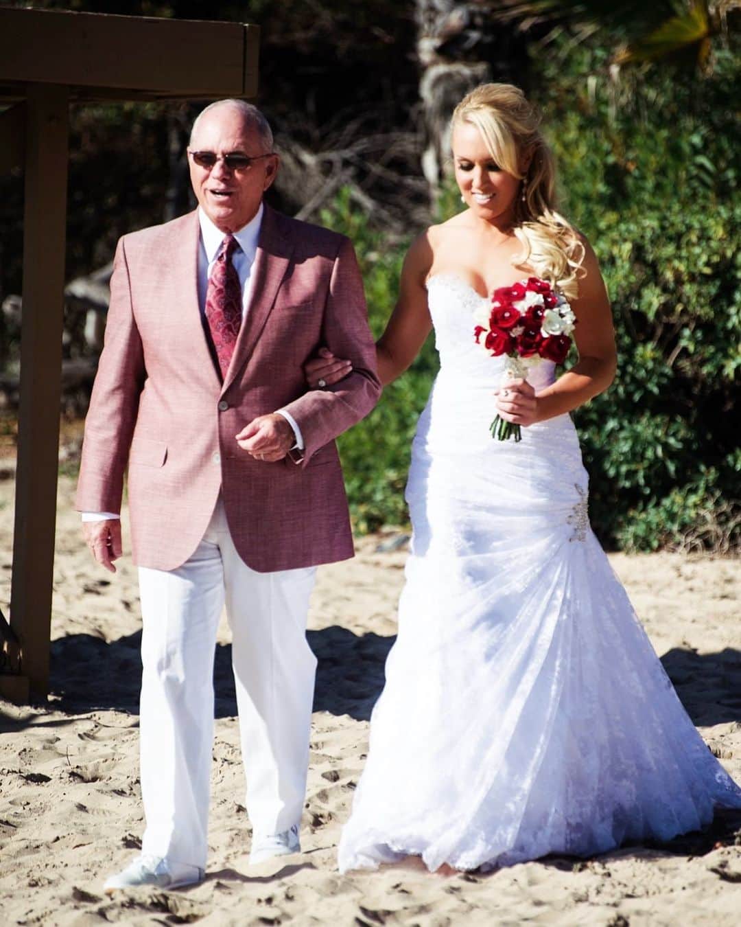 ナタリー・ガルビスのインスタグラム：「Happy Birthday Butchie! This picture 10 years ago represents the man that you have been in my life today &  since I was 18!  Walking me down the sand for my wedding and look sharp as always doing it!  Hope you have the best BIRTHDAY!!!」