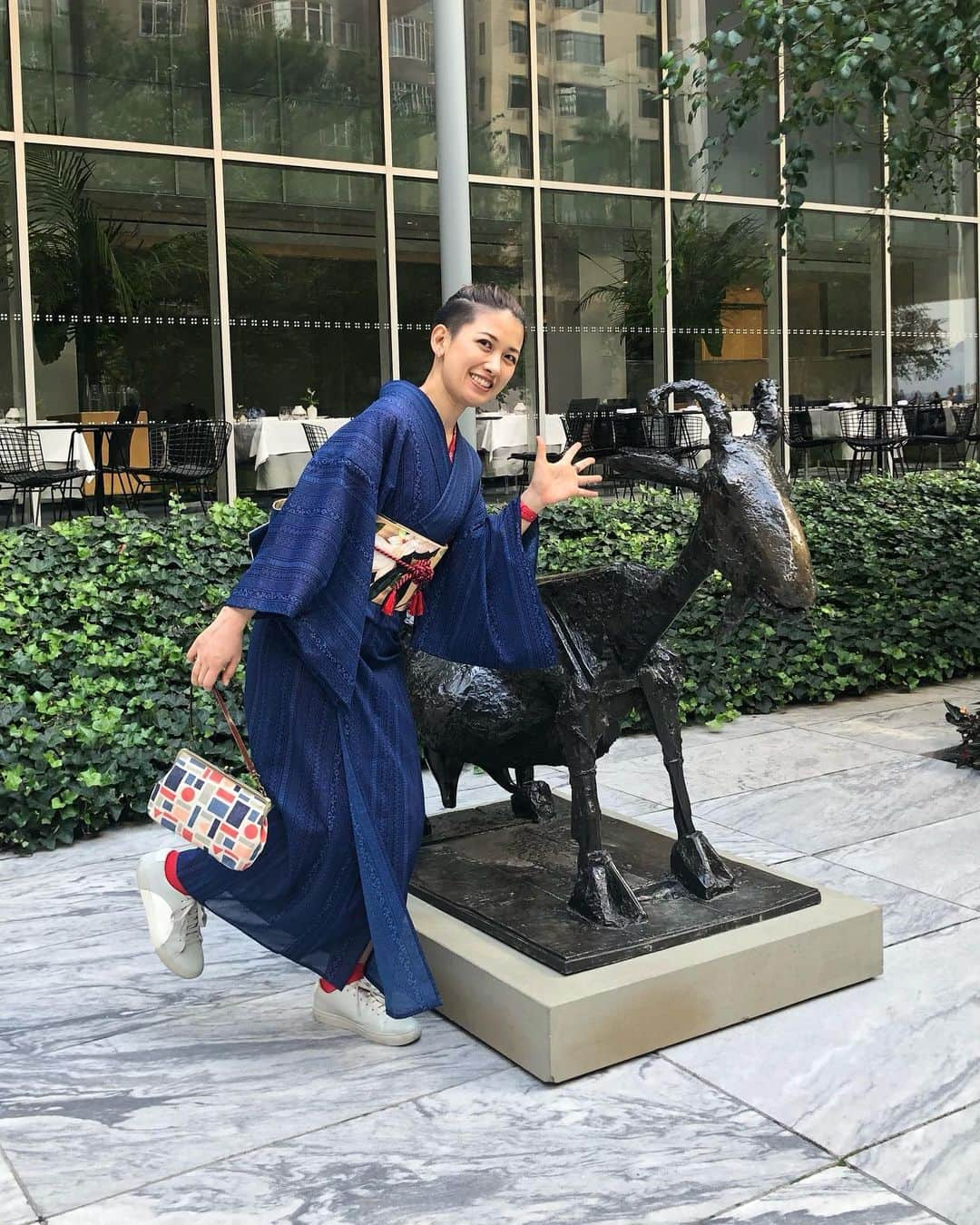 岡田育さんのインスタグラム写真 - (岡田育Instagram)「Summer kimonos are sheer layered. This one is also machine washable! ☀️⛄️👘🛟🍺🐐 The obi was taken from “a bluebird and a magnolia tree” by #kokeikobayashi  @themuseumofmodernart  . 涼しいけど小雨予報もあった日、家で洗えるものしか着てない。 #福服 で買った帯締め、冬物だろうけど #泉屋 の浮き輪っぽいのでマリンルックということで（？）。駆け寄ってきた見知らぬ人が「スマホ貸しなさい私が全身撮ってあげる！」と大量にシャッター切ってくれたけど大半が二枚目みたいな出来だった。ありがとね。 . #夏着物 #夏着物コーデ #ポリ絽小紋 #洗える着物  #ワンピ襦袢 @kimonomodern  #半幅帯 #白華小禽 #小林古径 @gofukuyasan  #文庫片流し #和紙ソックス #玉結び #theynewyork #がま口ポーチ  #キモノ #リサイクル着物 #着物女子 #kimonofashion  #japanesekimono  #👘🔰 #着物修行中  #kimonostyle #kimonofashion  #着物スタイリング #カジュアル着物 #普段着着物 #kimonolovers #着物好き」8月28日 23時49分 - okadaic