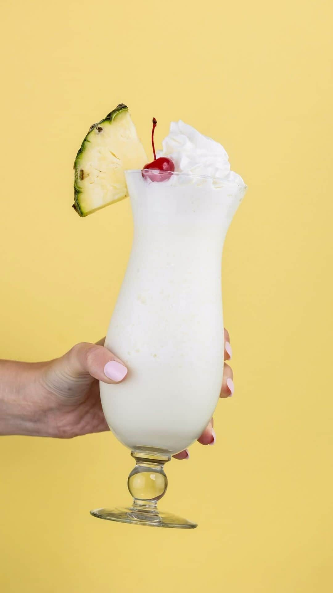 コールド・ストーン・クリーマリーのインスタグラム：「This is what we call a 10-minute [tropical] vacation. 😍🌴🍍 Watch how to make a Pina Colada at home with our Sweet Cream Ice Cream for the sweetest staycation! 🏡   Celebrate our 35th anniversary with us all year long and stay tuned for more Cold Stone® Cocktail recipes! 🥂   Ingredients 🥃 3 oz Coconut Rum 🍍 ½ cup Pineapple Juice 🥥 2 TBSP Coconut Cream 🍦 6 oz Sweet Cream Ice Cream - Pro tip: get your ice cream delivered right to your door! 🧊 2 cups Ice   ✨Blend for 25 seconds✨   🍒Garnish with Pineapple, whipped Cream & a Maraschino Cherry   Cheers!」