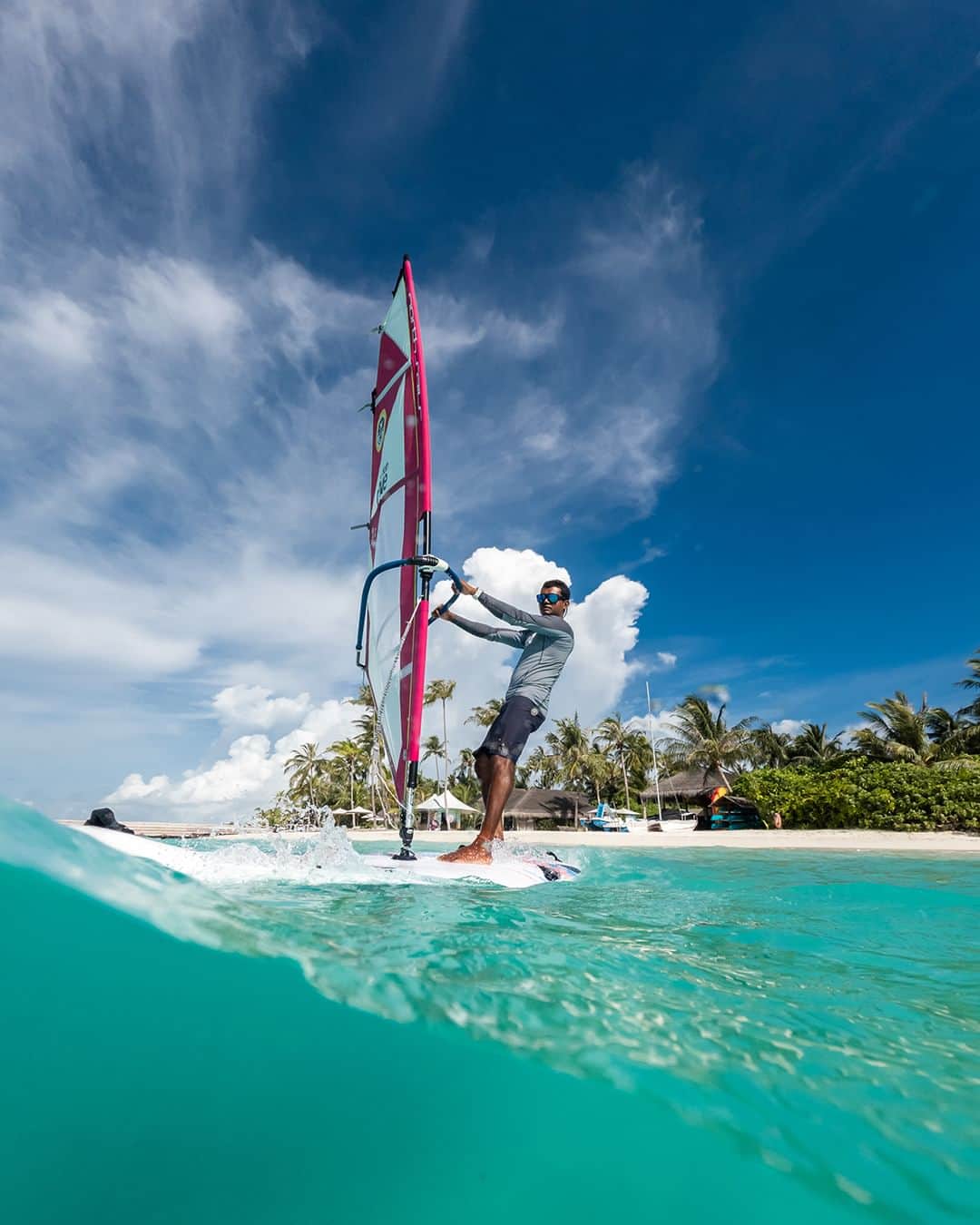 Velaa Private Islandのインスタグラム：「Making the most of a breezy afternoon across our glistening lagoon, have you tried windsurfing in paradise? #VelaaMoments #VelaaPrivateIsland」