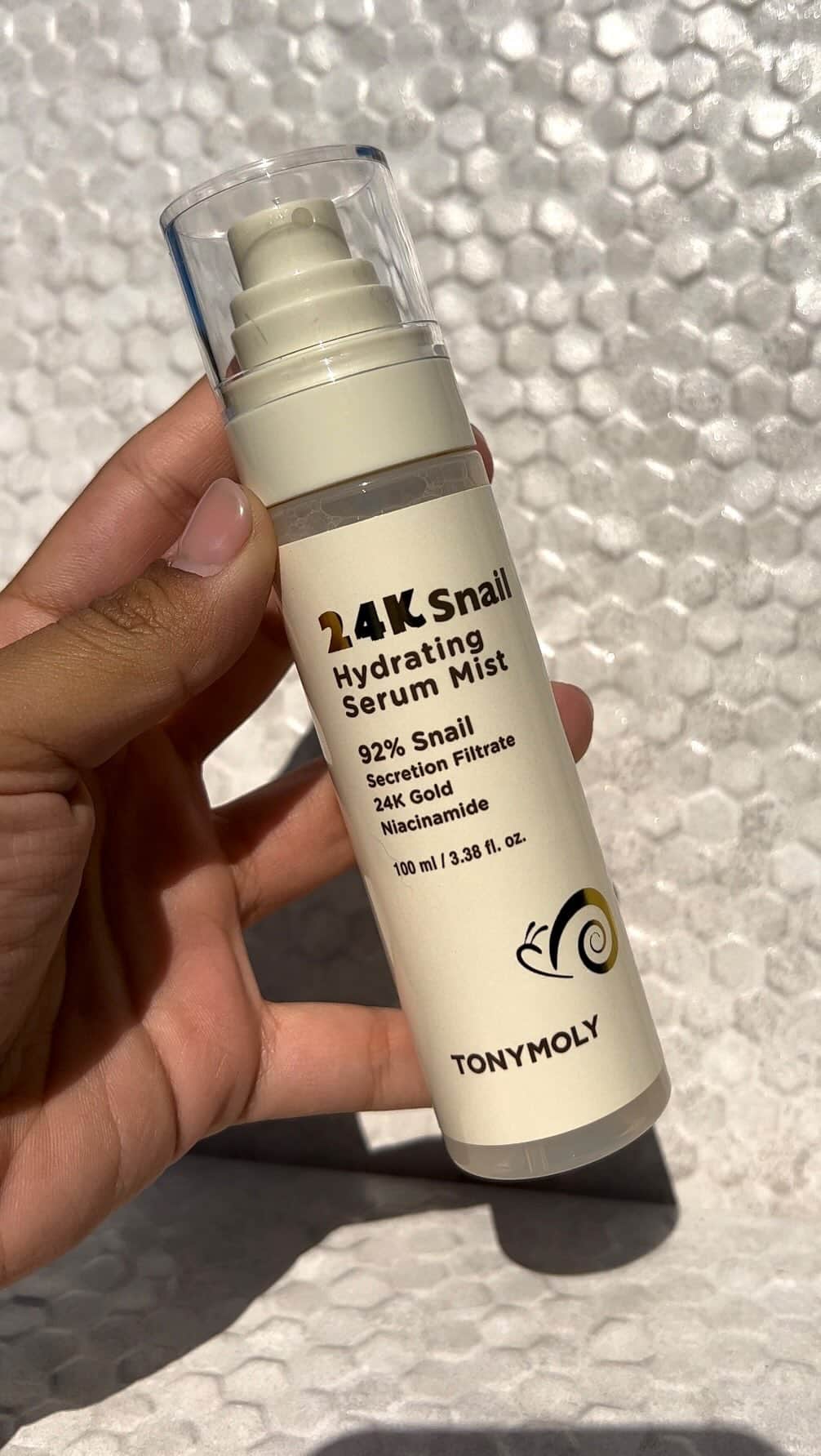 TONYMOLY USA Officialのインスタグラム：「Did someone say 92% snail? 🐌✨ Unlike other mists that are mostly water, our 24K Snail Hydrating Serum Mist is formulated with 92.3% snail secretion filtrate, the ultimate glow-boosting ingredient! Get ready to drench your skin in hydration and glow like never before! 💧🌟 #xoxoTM #TONYMOLYnMe #24ksnailmagic」