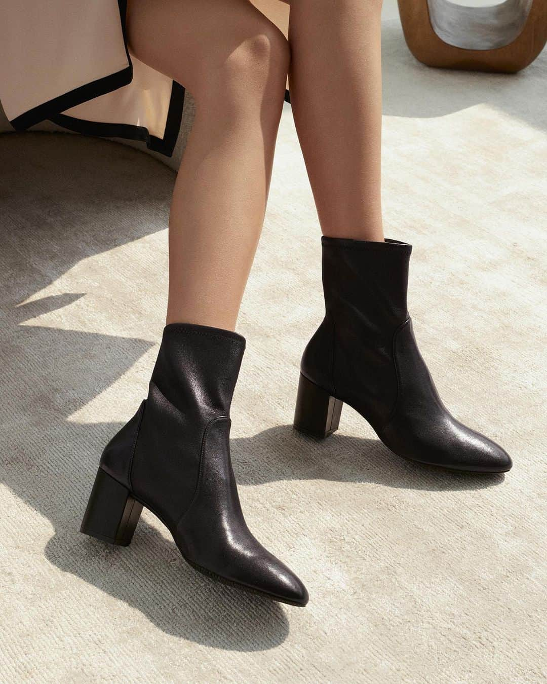 スチュアートワイツマンのインスタグラム：「From casual everyday ankle boots to versatile block-heel booties to dress up or down to dressy sock booties, you'll find the perfect pair for any outfit. Explore the Little Black Boots Capsule to find any look you could ever want, available to shop on stuartweitzman.com.​  ​  #StuartWeitzman」